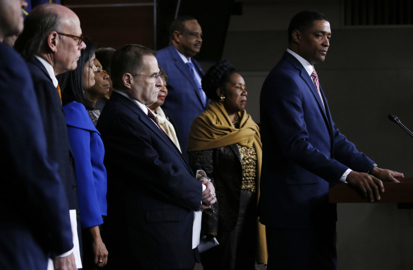Congressional Black Caucus Chairman Cedric L. Richmond and fellow members hold a news conference (photo credit: REUTERS/LEAH MILLIS)