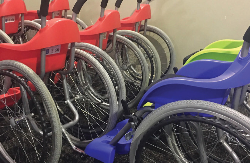 Wheelchairs of Hope: Putting wheels in motion to change people’s lives (photo credit: BENITA LEVIN)