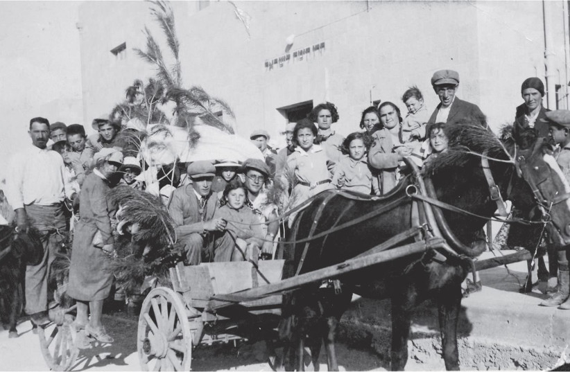 Atarot residents bring produce as ‘first fruits’ to JNF’s Jerusalem offices. (photo credit: ATAROT HERTIAGE ARCHIVES)