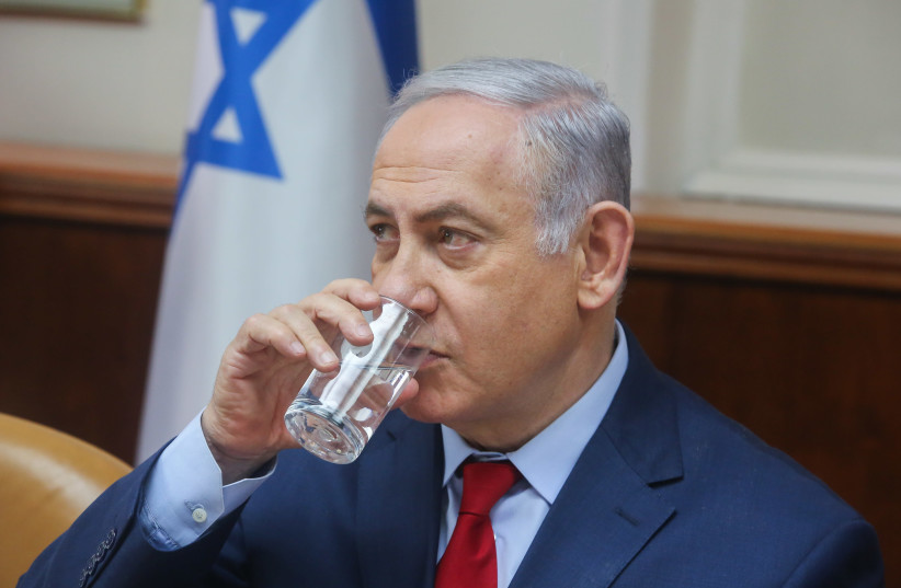 Prime Minister Benjamin Netanyahu at cabinet meeting, March 11, 2018 (photo credit: MARC ISRAEL SELLEM/THE JERUSALEM POST)