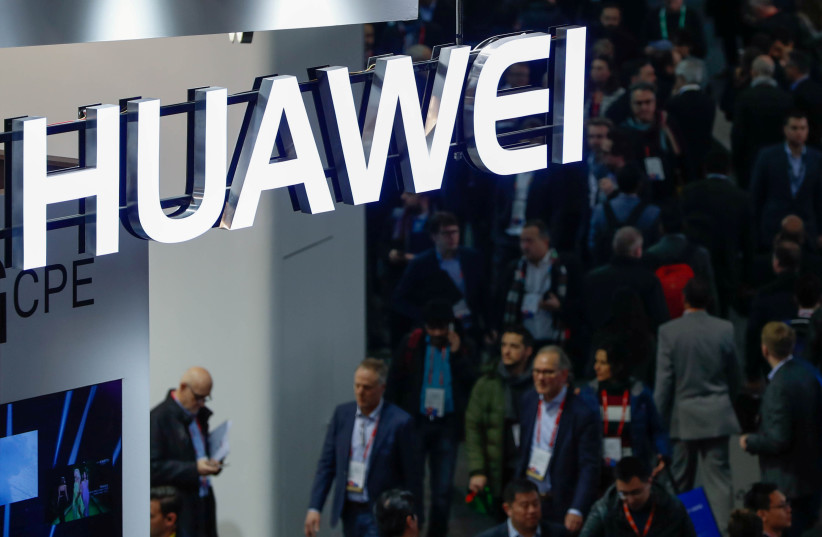 A logo of Huawei is seen during the Mobile World Congress in Barcelona, Spain, February 27, 2018. (photo credit: REUTERS/YVES HERMAN)