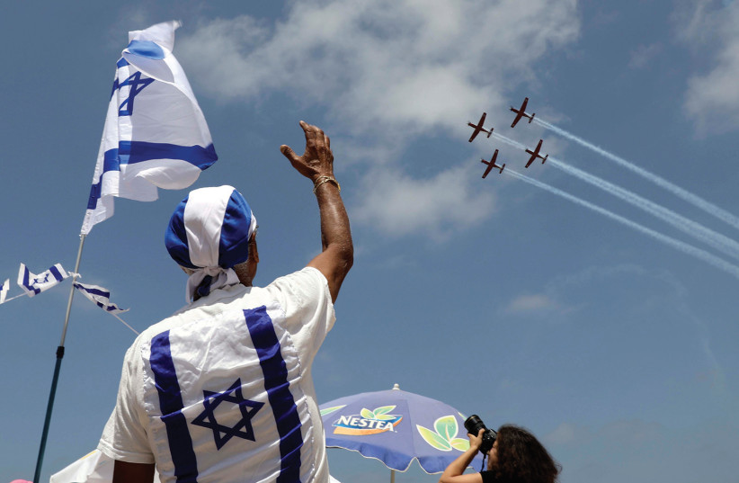  ISRAEL WILL be celebrating again soon. (photo credit: REUTERS)