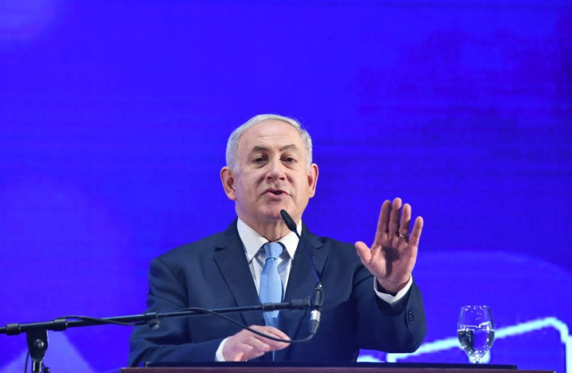 Prime Minister Benjamin Netanyahu at a Likud Passover event, March 22, 2018 (photo credit: AVSHALOM SASSONI)
