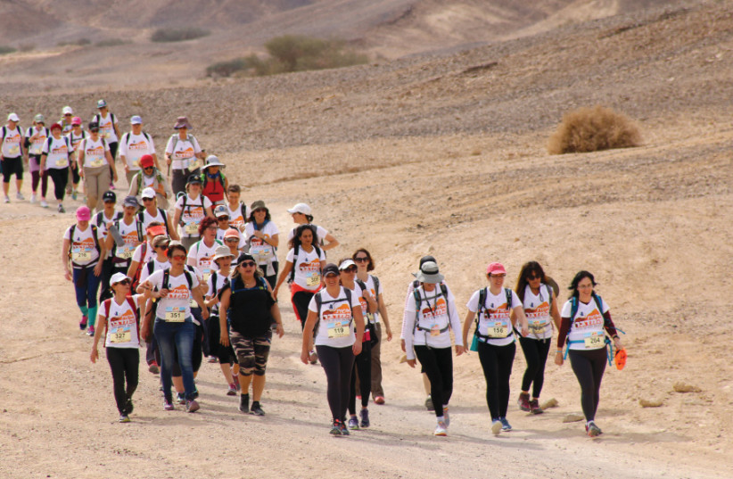 Agunot and former agunot during Yad L’Isha’s  first-annual Eshet Hamidbar (Woman of the Desert) 22-kilometer walk (credit: IRIT AMIT)