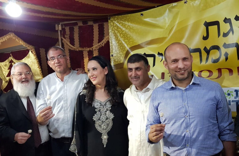 MK and Education Minister Naftali Bennett at the Mimouna hosted by the Harosh family in Lod (photo credit: Courtesy)