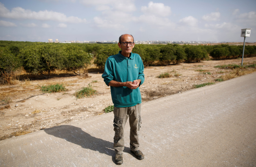 Farmer Daniel Rahamim in Kibbutz Nahal Oz, near the Gaza Strip border, Israel April 8, 2018 (photo credit: AMIR COHEN/REUTERS)