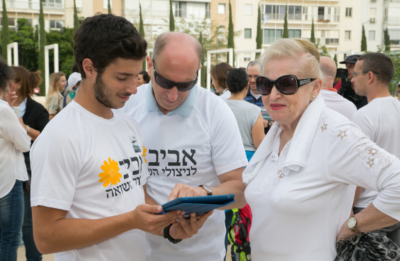 Volunteers from Aviv LeNitzolei HaShoah (photo credit: BENI LAPID)