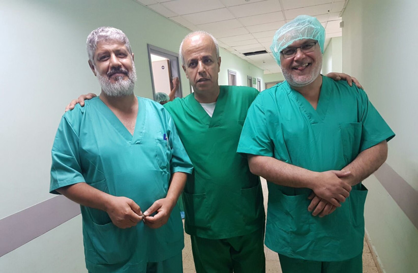 Doctors from the NGO Physicians for Human Rights volunteering at a hospital in Gaza (photo credit: PHYSICIANS FOR HUMAN RIGHTS)