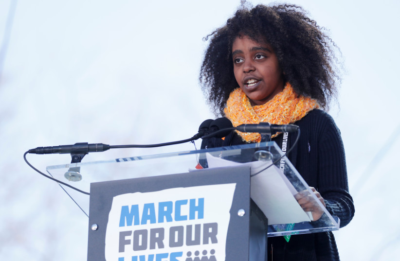 11-year-old student Naomi Wadler speaks as students and gun control advocates hold the "March for Our Lives" event demanding gun control after recent school shootings at a rally in Washington, US, March 24, 2018. (photo credit: REUTERS/JONATHAN ERNST)