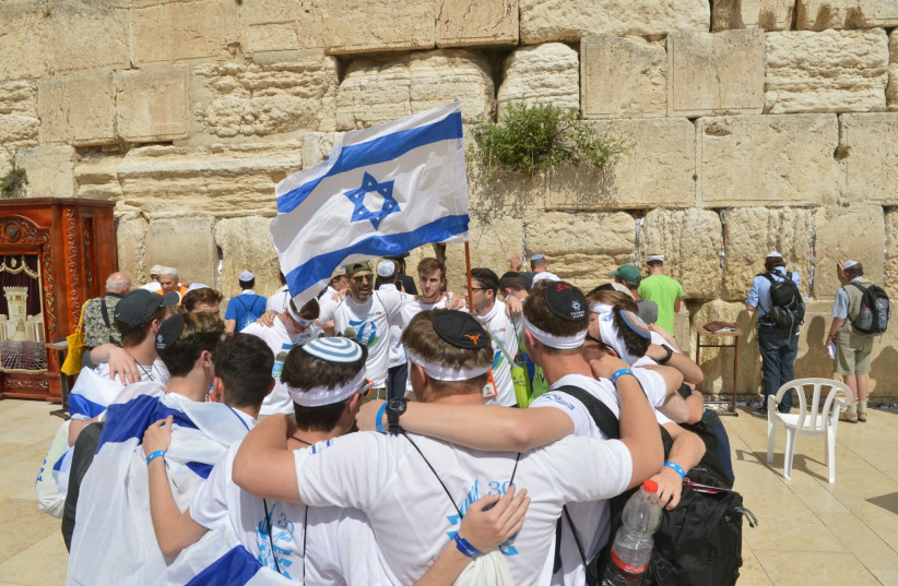 Youth from all over the world celebrating Israeli independence at the Western Wall (photo credit: YOSSI ZELIGER)
