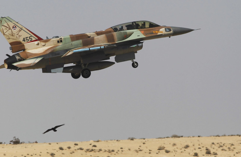 An Israeli F-16 fighter jet takes off from Ramon air base in southern Israel during routine training, October 21, 2013. (credit: AMIR COHEN/REUTERS)