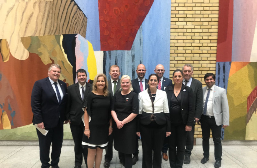 MKs Aliza Lavie of Yesh Atid (front left), Anat Berko of Likud (front Right), and Amir Ohana of Likud (back center) along with Norwegian parliament members at an event in which a pro-Israel caucus was founded at the parliament in Oslo (photo credit: Courtesy)