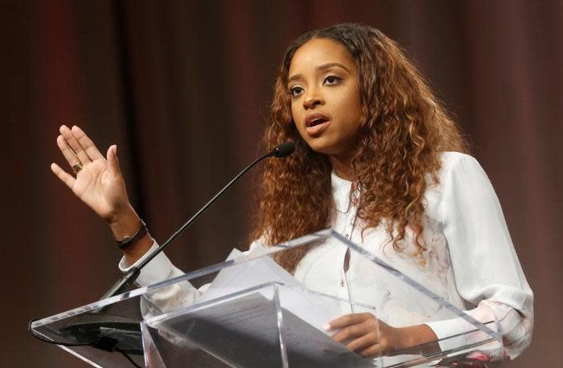 Tamika Mallory, National Co-Chair, Women's March, addresses the audience during the opening session of the three-day Women's Convention at Cobo Center in Detroit, Michigan, US, October 27, 2017 (photo credit: REUTERS/REBECCA COOK)