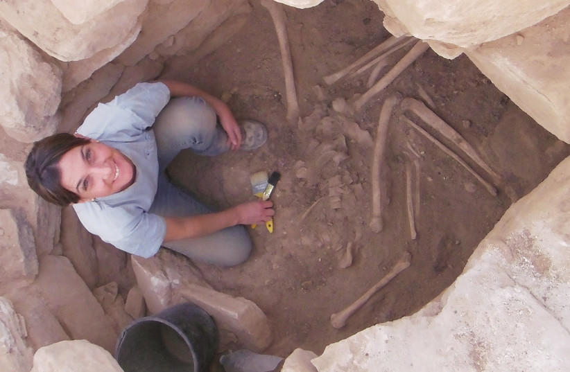 AN ANTHROPOLOGIST at the Dan David Center for Human Evolution and Biohistory Research in the middle of an excavation. (photo credit: Courtesy)