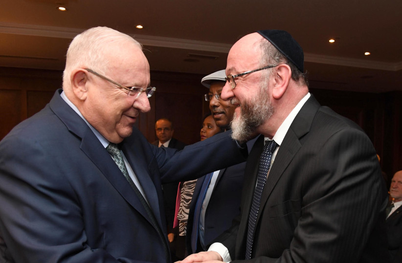 President Revuen Rivlin and UK Chief Rabbi Ephraim Mirvis meet in Addis Ababa (photo credit: MARC NEYMAN/GPO)