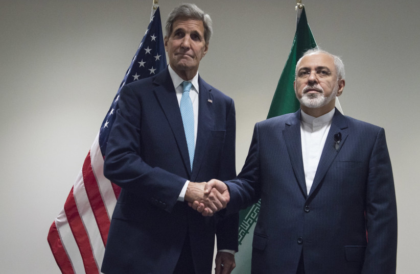 Former United States Secretary of State John Kerry (L) meets with Mohammad Javad Zarif, Minister of Foreign Affairs of Iran, at the United Nations in New York, September 26, 2015. (photo credit: REUTERS/STEPHANIE KEITH)
