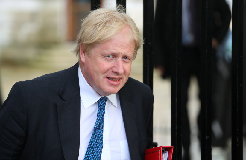 Britain's Foreign Secretary Boris Johnson arrives for a meeting at Downing Street in London, Britain, May 2, 2018.  (photo credit: REUTERS/HANNAH MCKAY)