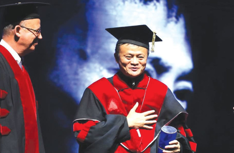 JOSEPH KLAFTER (left) and Jack Ma (photo credit: CHEN GALILI)