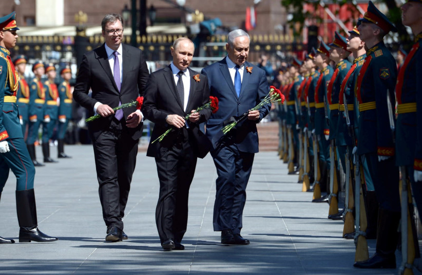Prime Minister Benjamin Netanyahu and Russian President Vladimir Putin at the Victory Day parade in Moscow, May 2018 (photo credit: PMO)