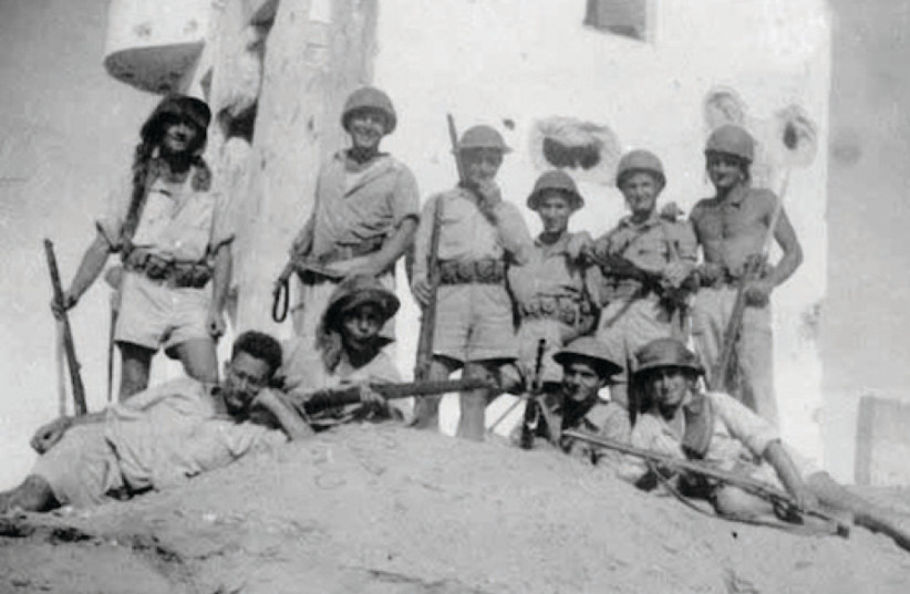 Negev Brigade and Kibbutz Dorot members resting after a May 15, 1948 battle (photo credit: Wikimedia Commons)