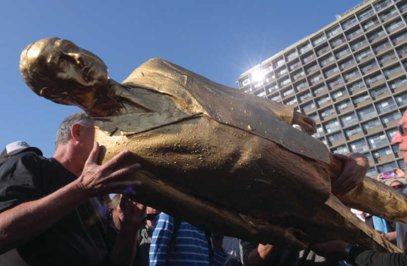 On December 6, 2016, Tel Aviv residents woke up to see a huge golden statue of Prime Minister Benjamin NetanOn December 6, 2016, Tel Aviv residents woke up to see a huge golden statue of Prime Minister Benjamin Netanyahu in Rabin Square (photo credit: AVSHALOM SASSONI)