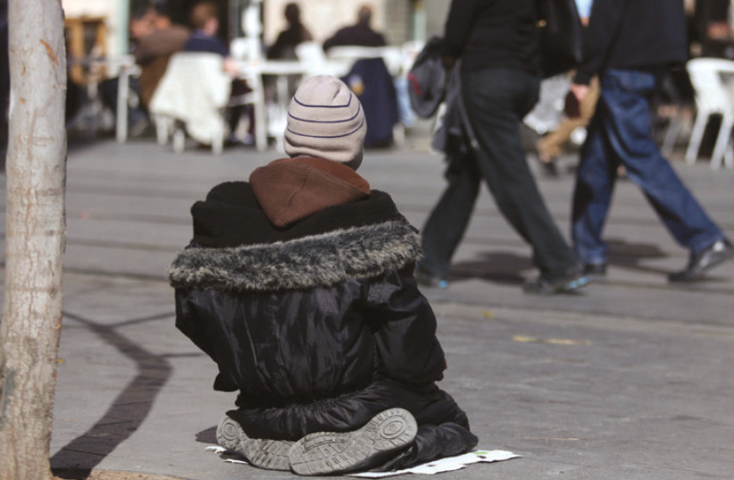 A beggar on Jerusalem’s Ben-Yehuda Street (photo credit: MARC ISRAEL SELLEM)