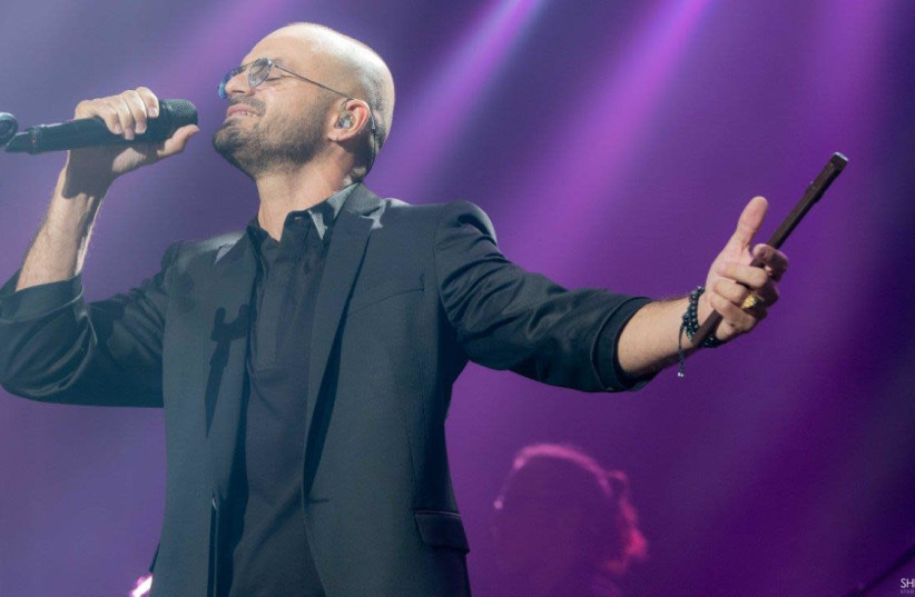 Israeli singer Avraham Tal performs in Caesaria, May 31, 2018 (photo credit: SHLOMI PINTO)