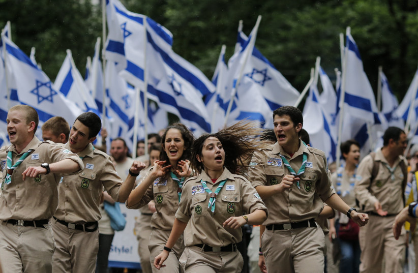 NEW YORK, NY - Members of the Israel Boy and Girl Scouts Federation participate in the annual Celebrate Israel Parade on June 3, 2018 in New York City. (photo credit: KENA BETANCUR/GETTY IMAGES/AFP)