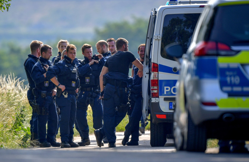 German police gather near Wiesbaden-Erbenheim, Germany, June 6, 2018. (photo credit: REUTERS/THORSTEN WAGNER)