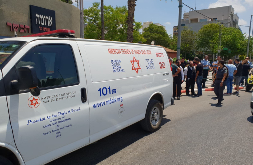 MDA ambulance at the scene of a stabbing in Afula (photo credit: MAGEN DAVID ADOM)