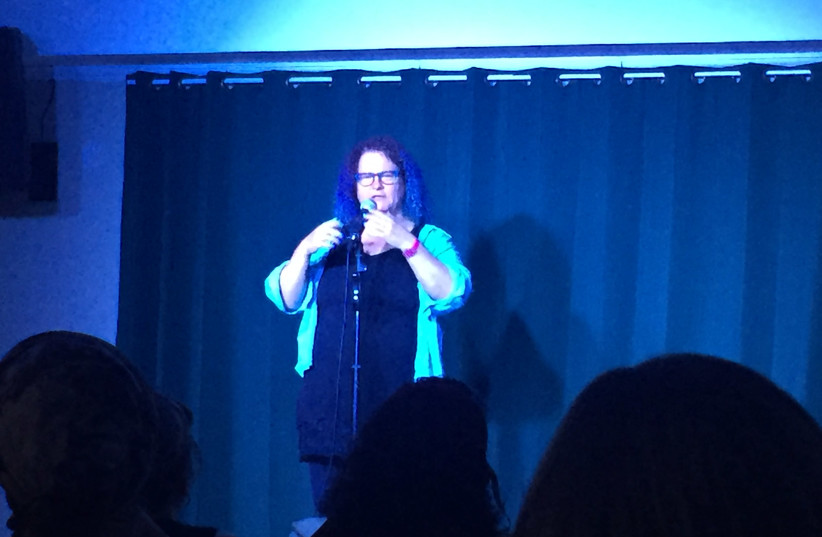 Hani Skutch performs her stand-up routine at Off the Wall Comedy Theater in King Solomon Hotel in Jerusalem Sunday night (photo credit: ELIANA SCHREIBER)