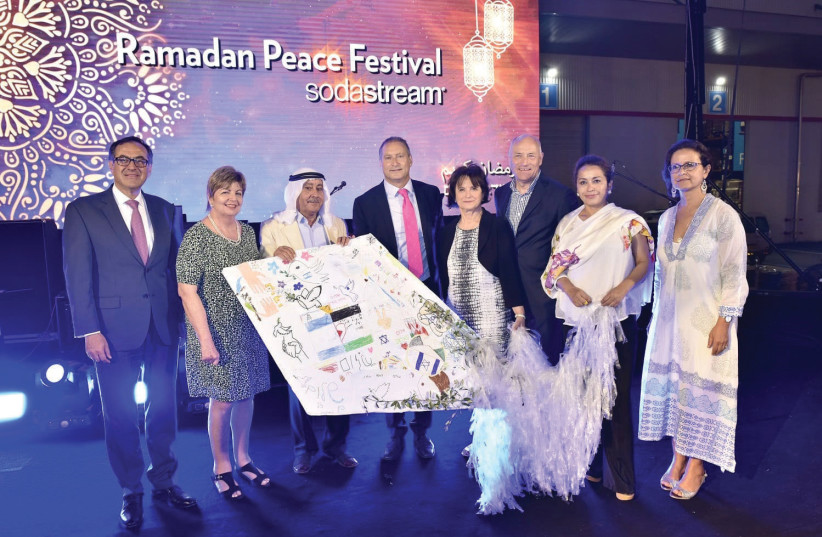 Daniel Birnbaum, Talal El Karnawi and ambassadors at the Ramadan Peace Festival (photo credit: GIL DOR)