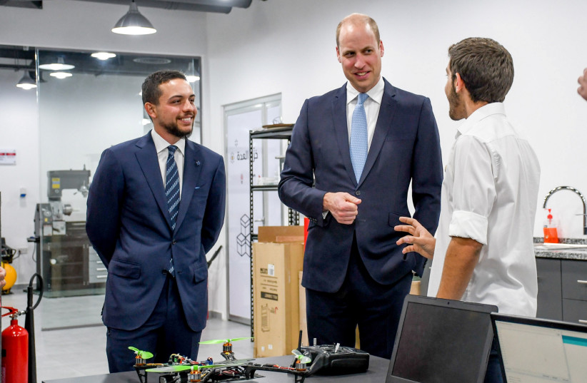 Britain's Prince William and Jordan's Crown Prince Hussein during their visit to the Crown Prince Foundation in Amman, Jordan, June 24, 2018. (photo credit: REUTERS)