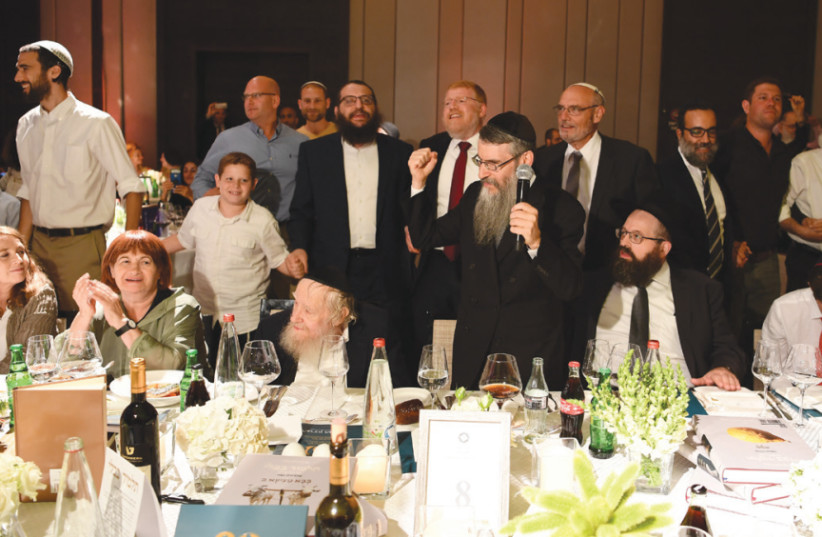 Avraham Fried sings for Rabbi Steinsaltz at the gala dinner in his honor on June 10 (photo credit: ISRAEL BARDUGO)