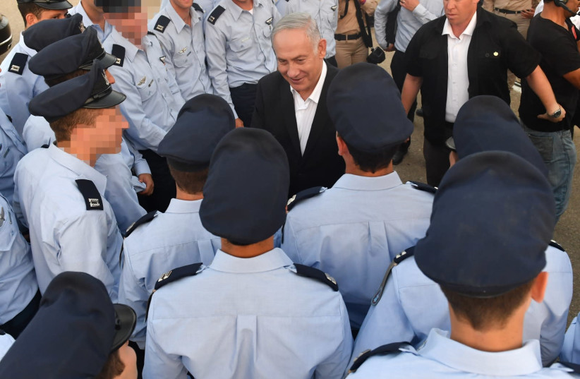 Prime Minister Benjamin Netanyahu speaking with IAF pilots  (photo credit: KOBI GIDEON/GPO)