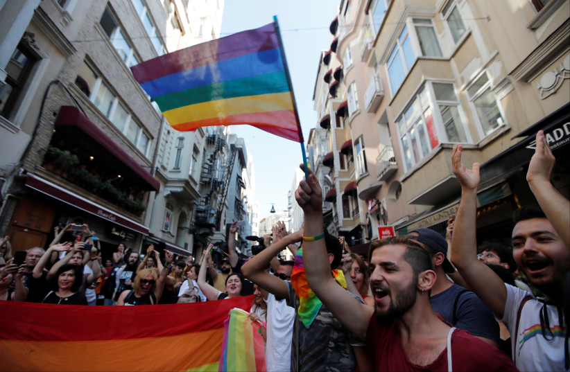 Members of LGBT community take part in a Gay Pride parade in central Istanbul, Turkey, July 1, 2018 (photo credit: OSMAN ORSAL/REUTERS)