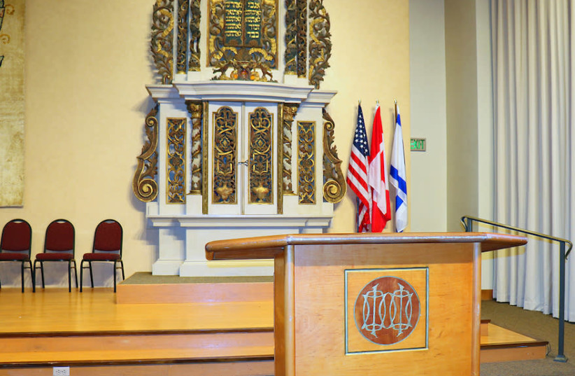 American, Canadian and Israeli flags are displayed in the S.H. and Helen R. Scheuer Chapel on the Cincinnati campus of the Hebrew Union College-Jewish Institute of Religion (credit: ADY MANORY)