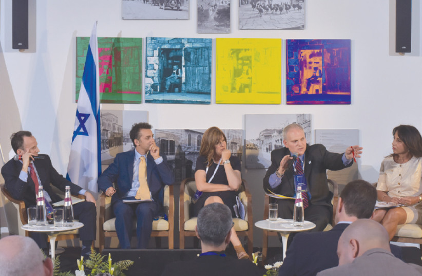 A panel discussion entitled Defending Israel's Legitimacy: The Battlefield in 2018, takes place during the Strategic Affairs Ministry's GC4I conference. (From left): David Brog, Tzahi Gavrieli, Wendy Kahn, William Daroff and Raya Kalenova (photo credit: MEDIA LINE)
