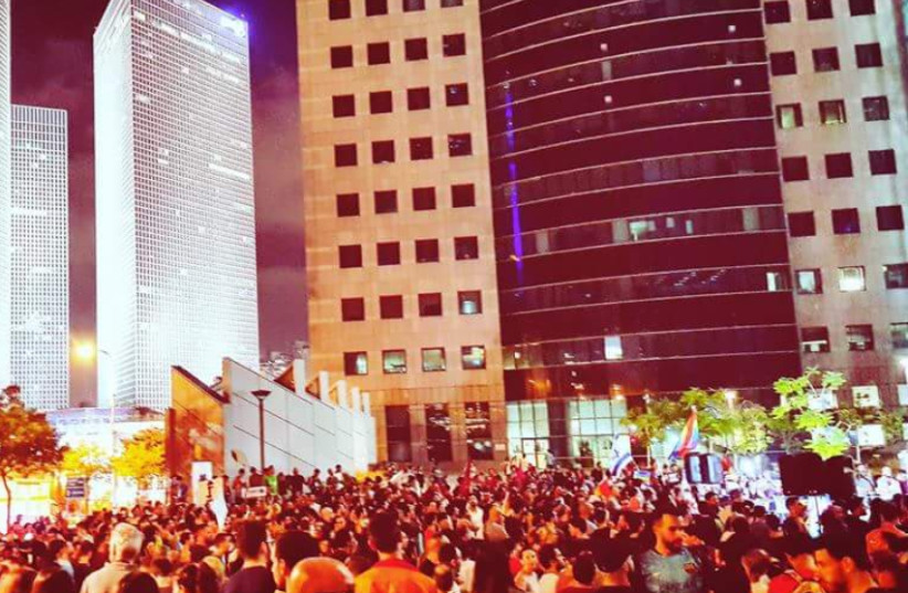 Thousands Protest Knesset's surrogacy bill on Saturday night in Tel Aviv (photo credit: SHIRA LEVRON)