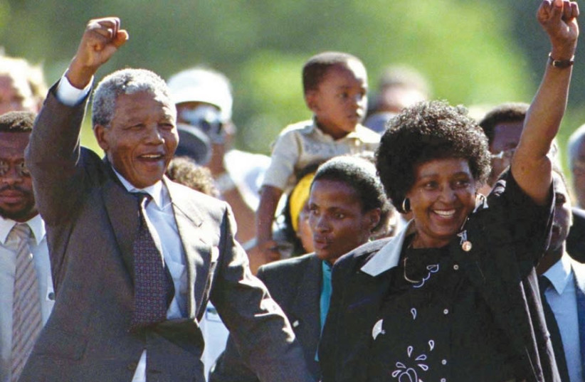 NELSON MANDELA walks out of the Victor Verster Prison near Cape Town in February 1990, after spending 27 years in jail (photo credit: ULLI MICHEL/REUTERS)