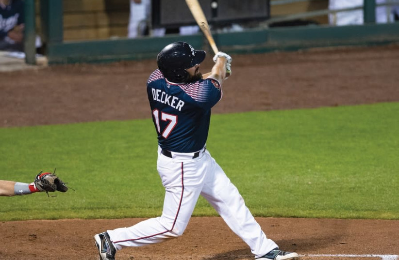 CODY DECKER takes a swing during a PCL baseball game (photo credit: RENO ACES)