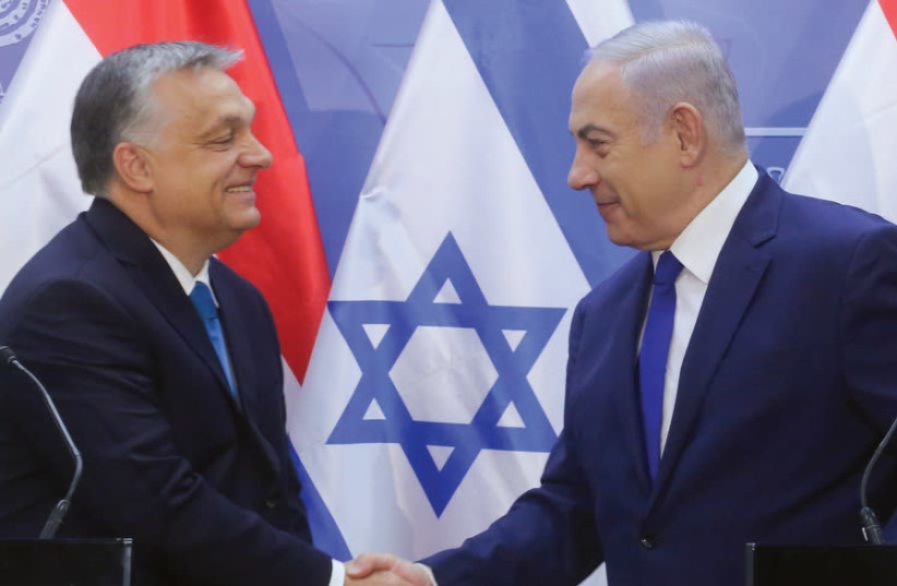 Hungarian Prime Minister Viktor Orban is welcomed to Jerusalem by Prime Minister Benjamin Netanyahu on July 19 (photo credit: MARC ISRAEL SELLEM)