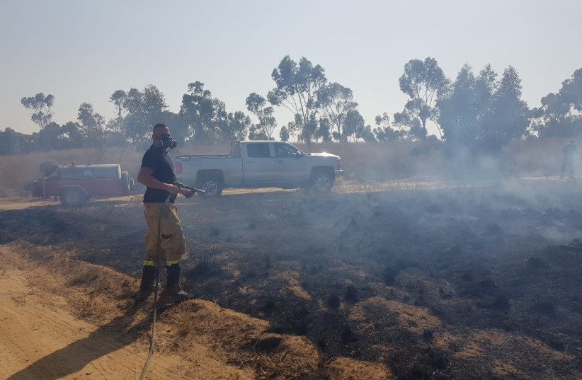 Extinguishing fires in Be'eri Forest (photo credit: MOSHE BARUCHI/KKL-JNF FORESTER)