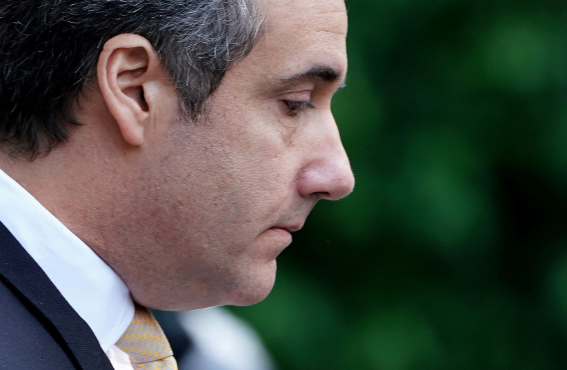 Donald Trump's former lawyer Michael Cohen walks out of court in New York City, New York, US (August 21, 2018).  (photo credit: REUTERS/CARLO ALLEGRI)