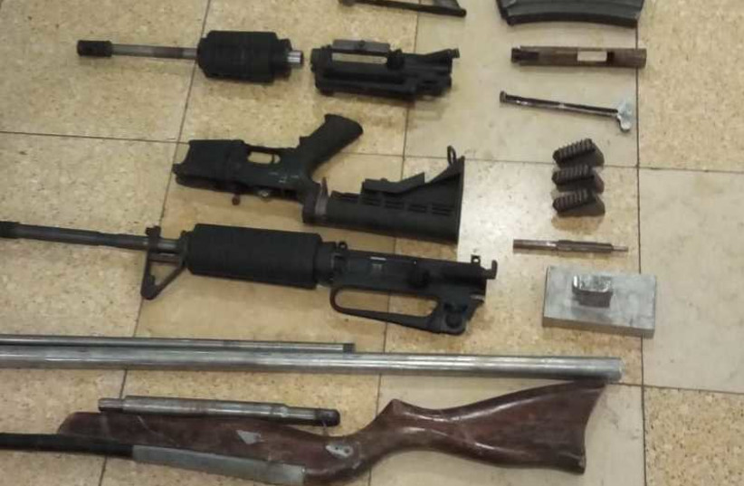 Police seize weapons in the village of Anata (August 26, 2018).  (photo credit: ISRAEL POLICE)