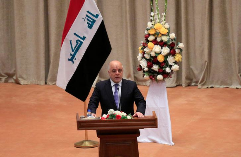 Iraqi Prime Minister Haider al-Abadi speaks during the first session of the new Iraqi parliament in Baghdad, Iraq September 3, 2018 (photo credit: REUTERS/STRINGER)