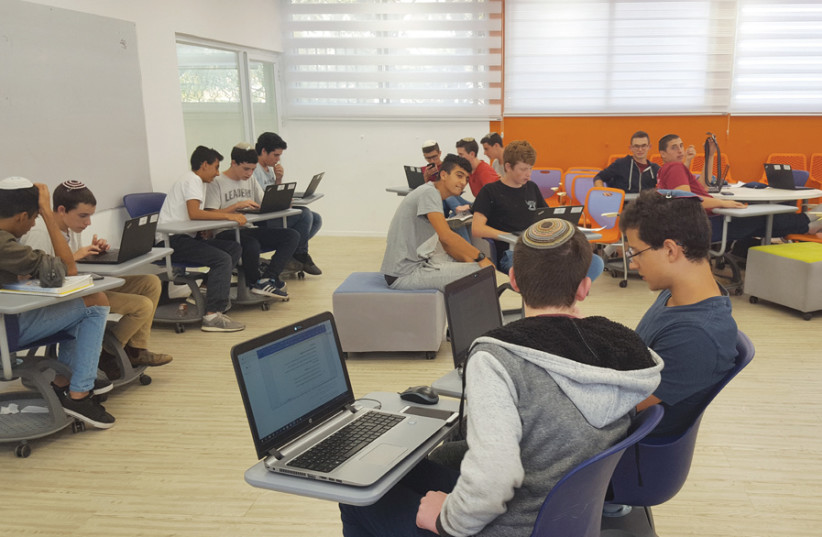 STUDENTS AT Amit Nahshon in Mateh Yehuda work in a classroom without walls. (photo credit: COURTESY AMIT)