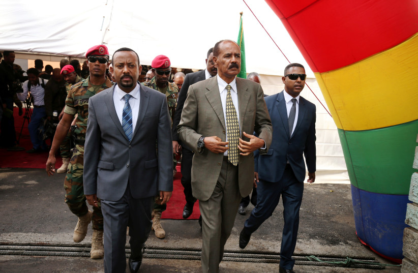 Eritrea's President Isaias Afwerki and Ethiopia's Prime Minister, Abiy Ahmed at inauguration ceremony of reopening Eritrean embassy in Addis Ababa, 2018 (photo credit: REUTERS/TIKSA NEGERI)
