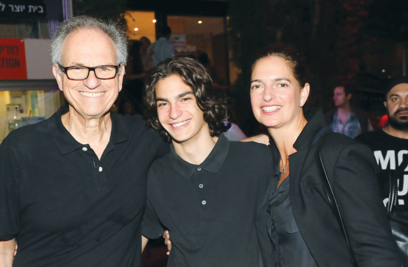 IRIS AND AVI Nesher with their son Ari at the opening night of the Haifa International Film Festival, where Avi Nesher’s new film ‘The Other Story’ was screened on September 22. (photo credit: RAFI DALOYA)