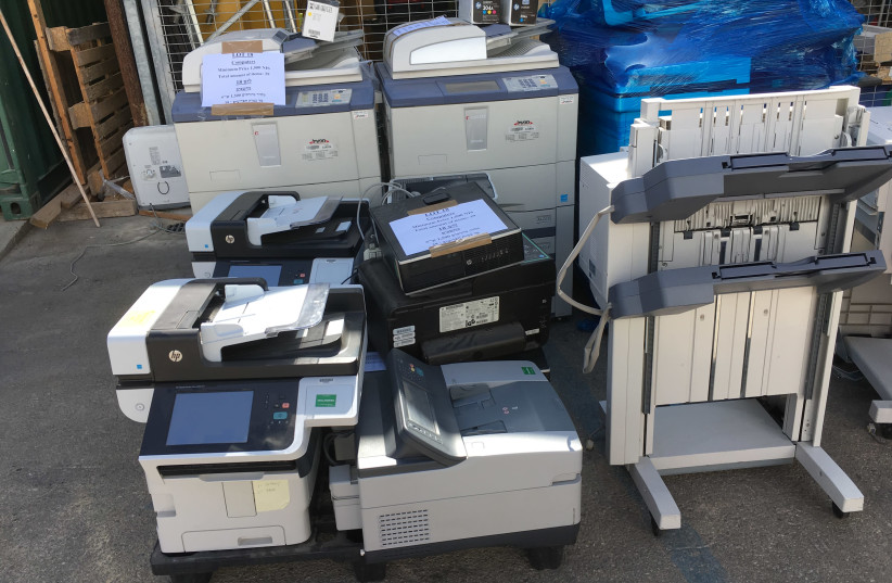 Printers and office machinery auctioned by the US Embassy (photo credit: YVETTE J. DEANE)